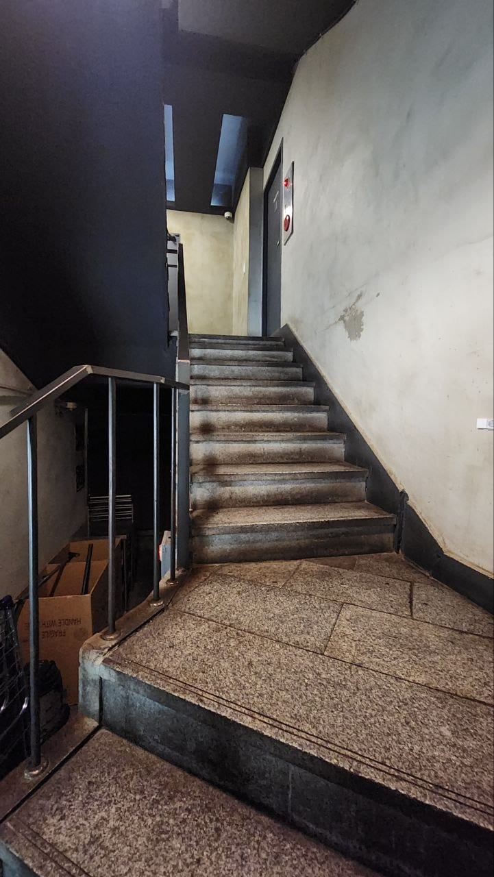 Internal staircase leading to the second floor of Brick Haus