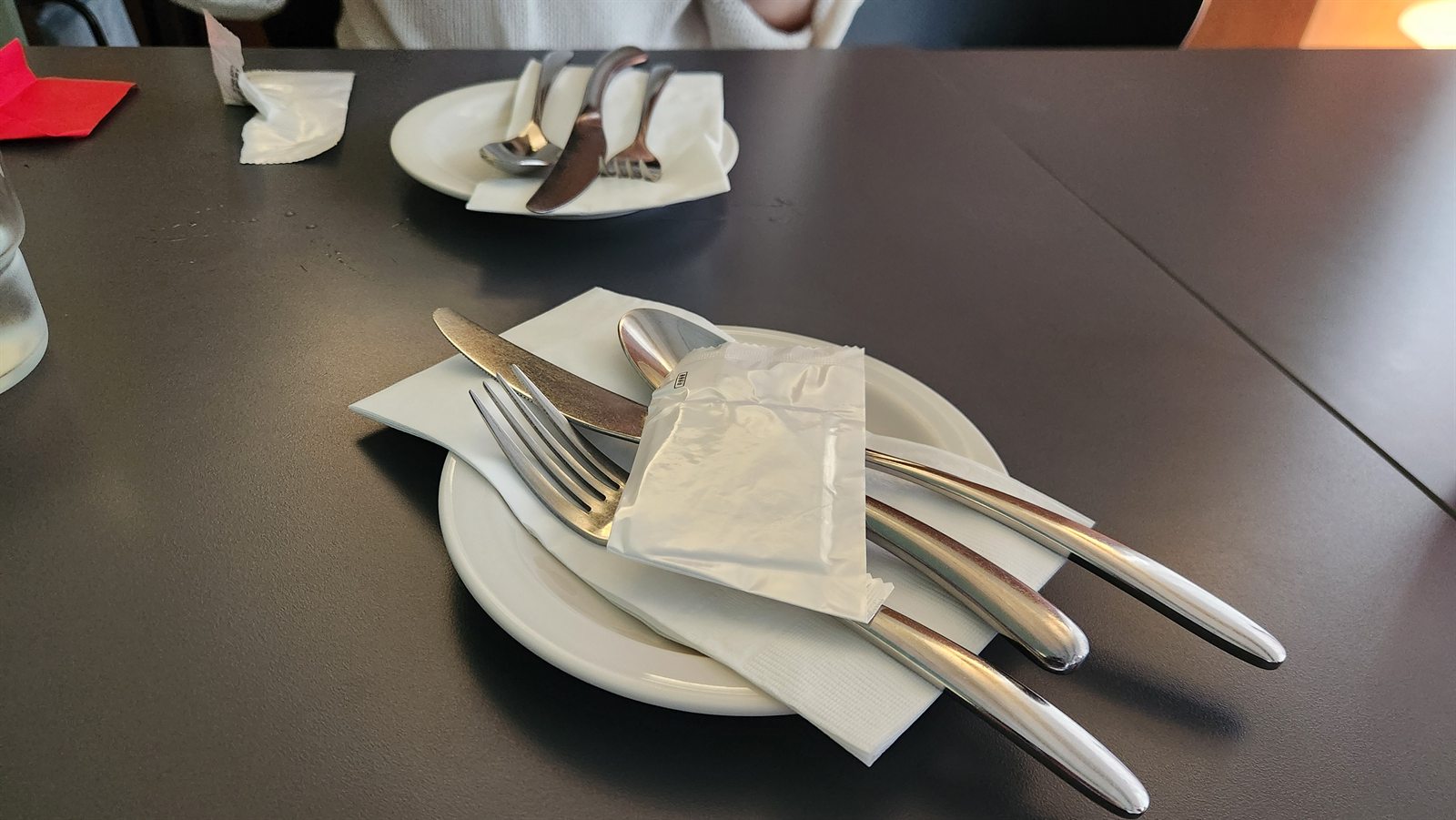 Table setting at Frater with plates and cutlery
